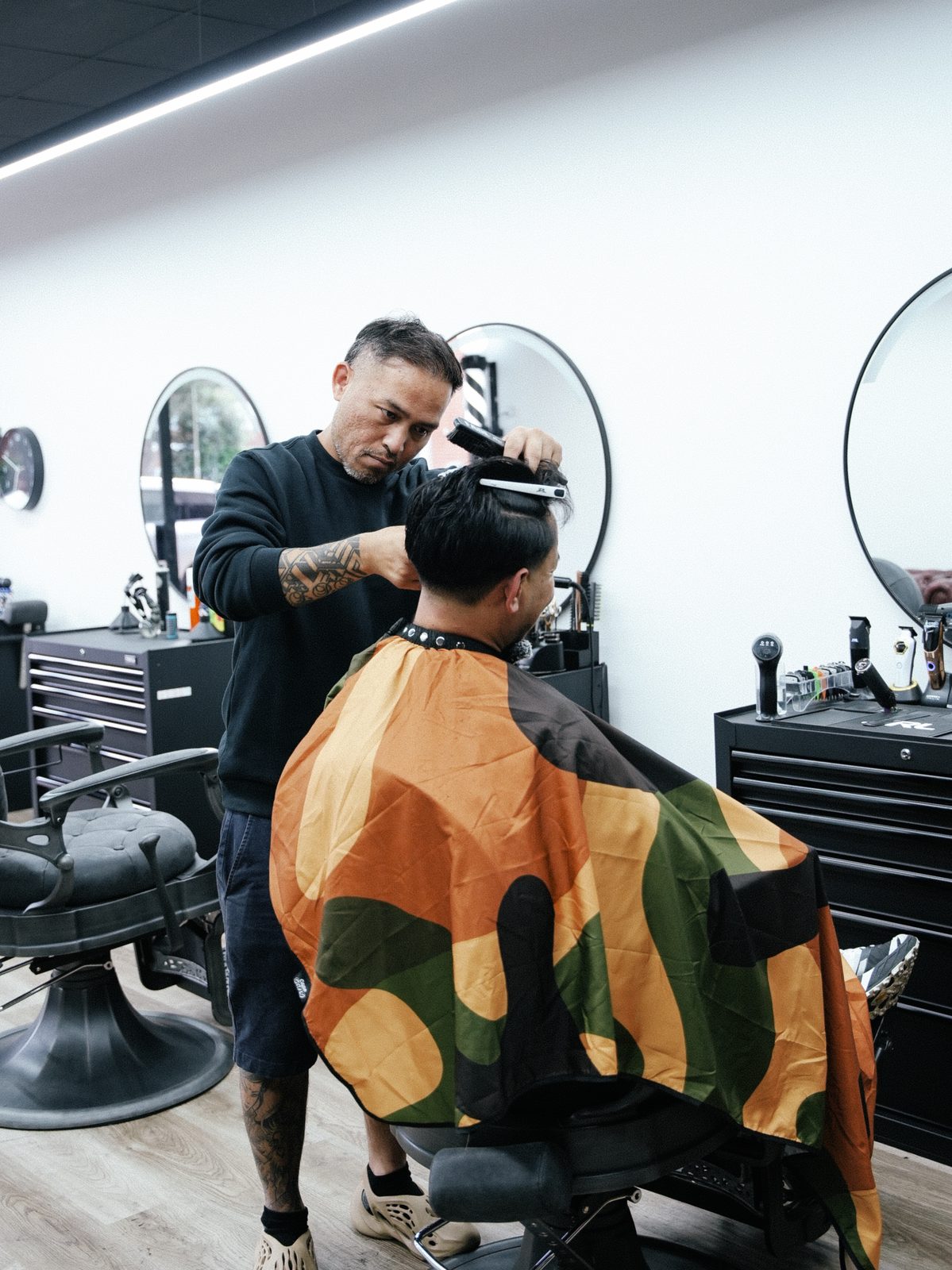 Santosh Gurung cutting hair at Fat Fade Farnborough